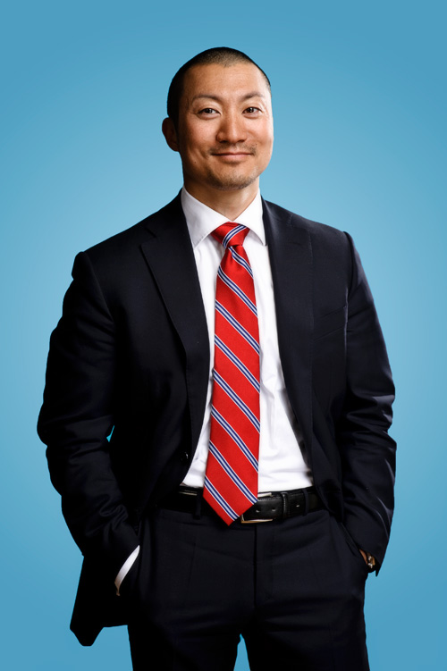 Business portrait on blue background