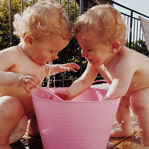 twins-bathing-outside